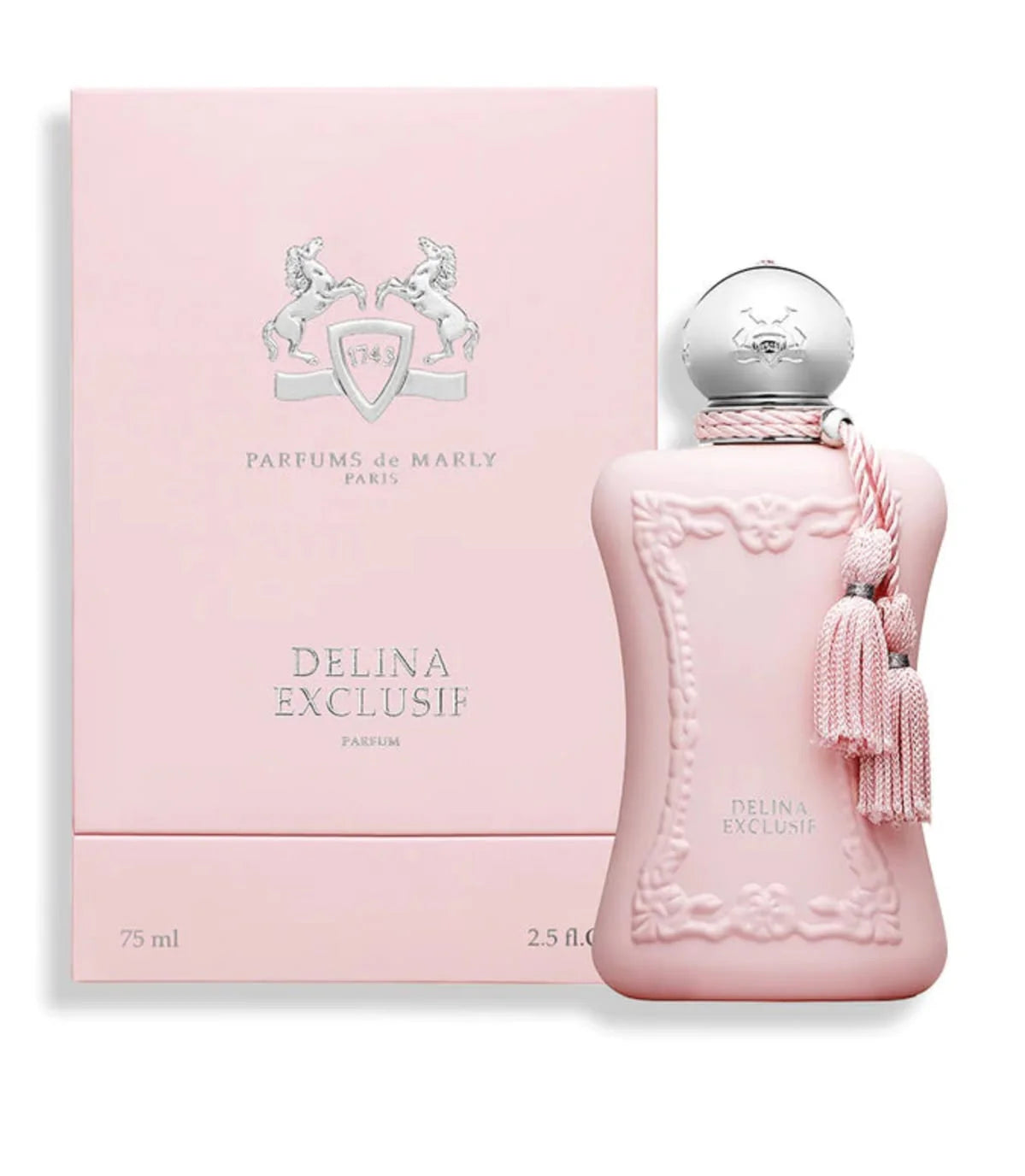 A pink perfume bottle with a silver cap and pink tassel next to its matching pink box, labeled Delina Exclusif by Parfums de Marly.